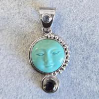 Reconstituted Turquoise Goddess Pendant with Tanzanite and Iolite