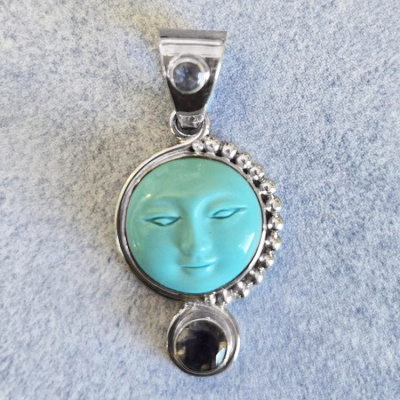 Reconstituted Turquoise Goddess Pendant with Tanzanite and Iolite